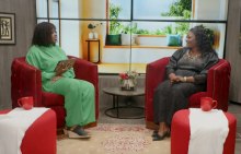 Two women sitting on couches