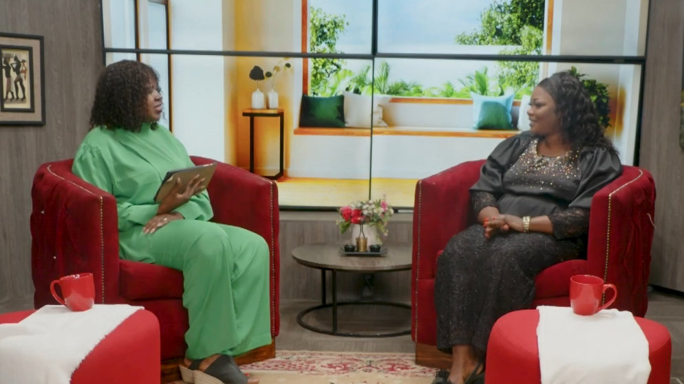 Two women sitting on couches